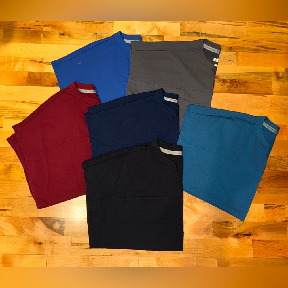 Fabletics Set of Six Women’s Evolve 3-Pocket Scrub Top in Various Colors
